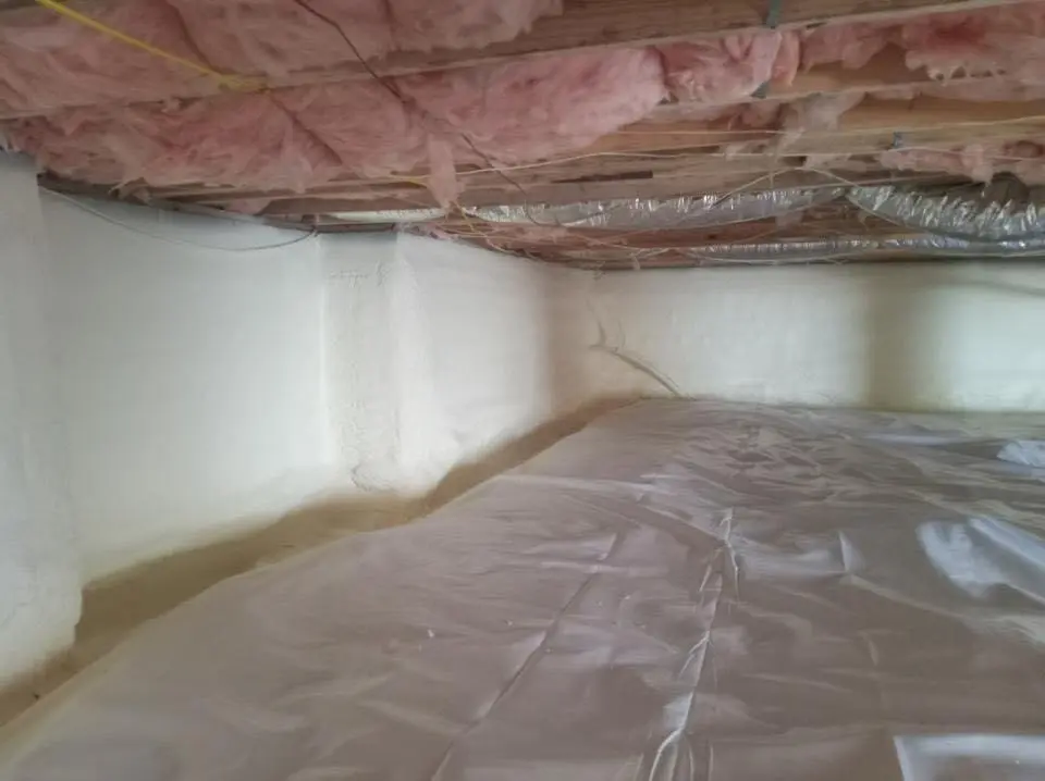 Crawl space encapsulation with closed-cell spray foam for Flat Roof Repair in New Carlisle